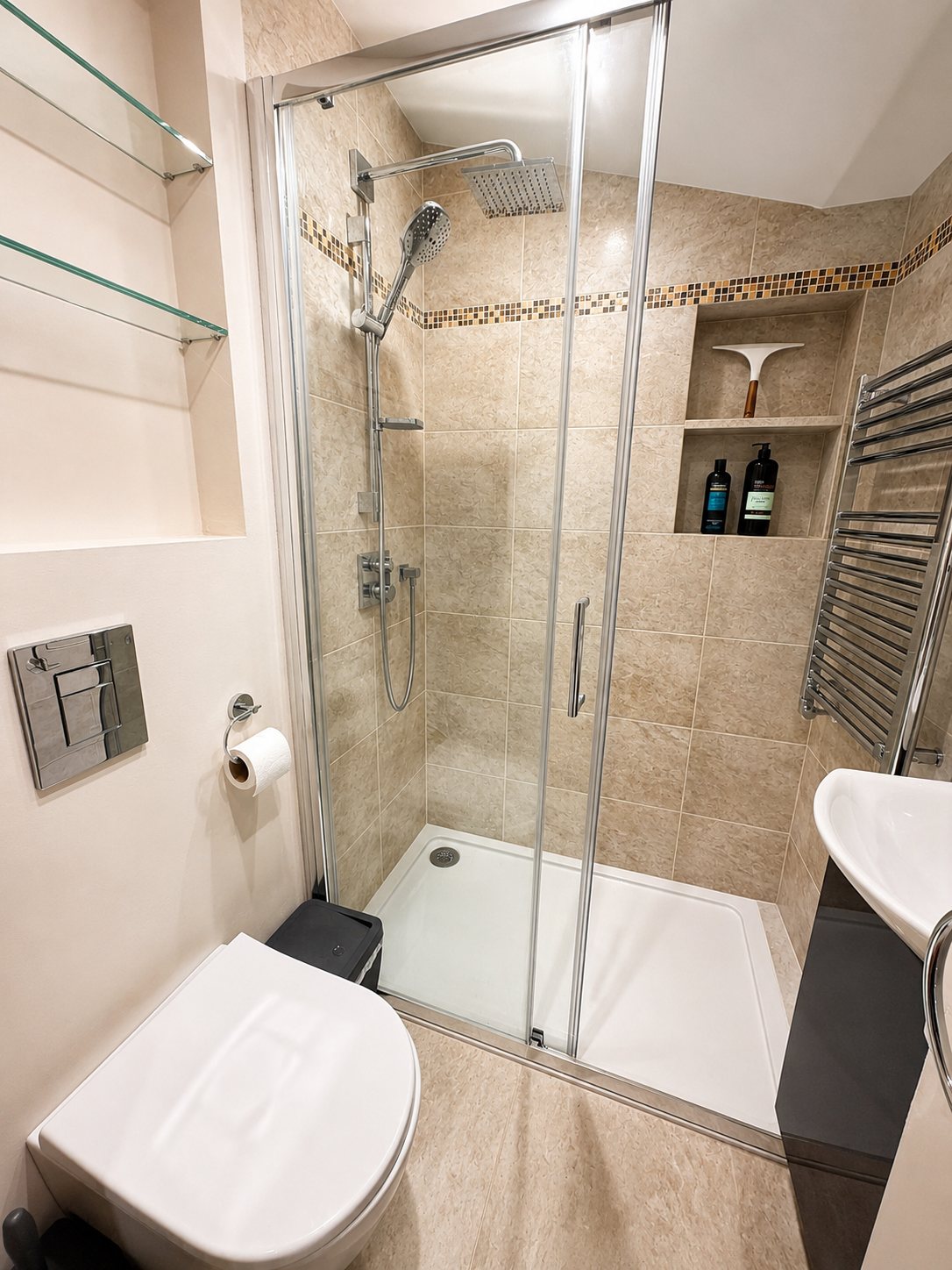 Ground-floor ensuite shower room with toilet and basin