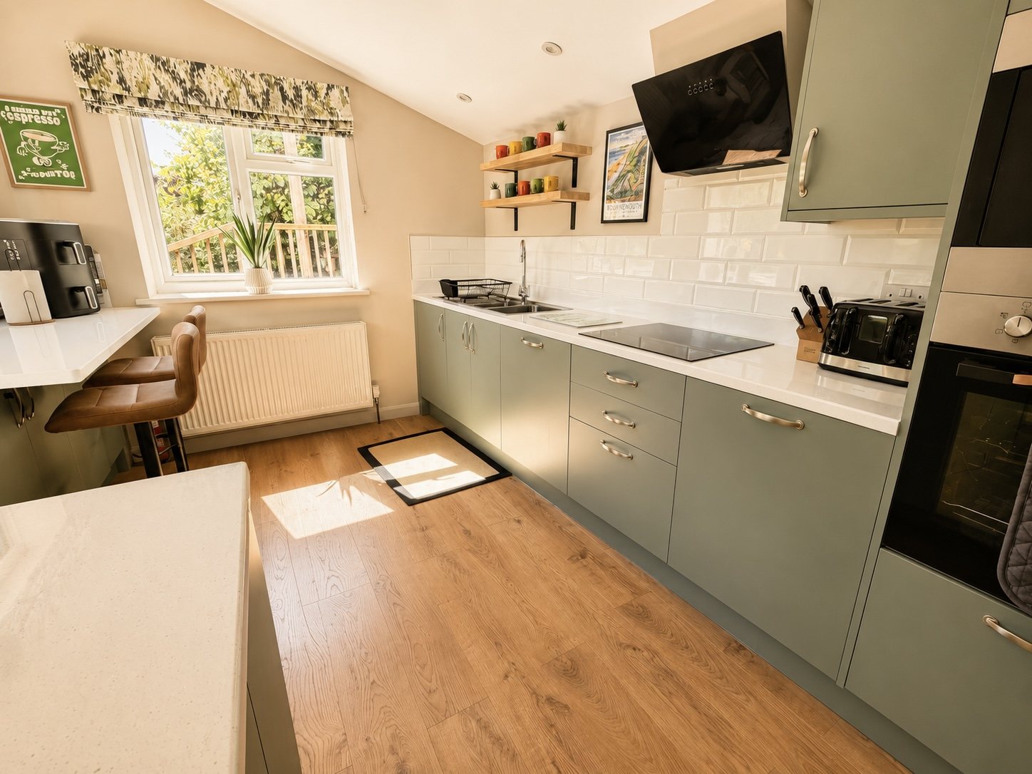 Fresh green and white kitchen at Gulliver's Rest